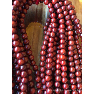 Perles en bois de santal rouge de petite taille